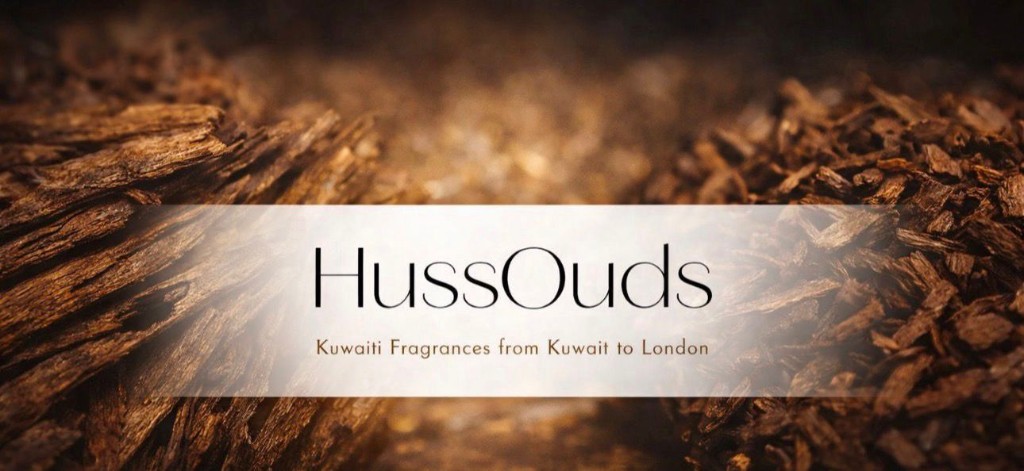HussOuds banner over agarwood background